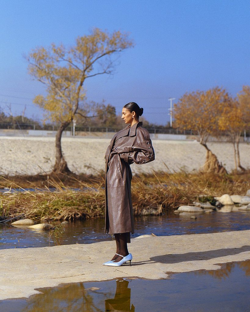 Trench by Mariusz Brzeziński , Shoes by 
Shushu/Tong, Tights by Falke